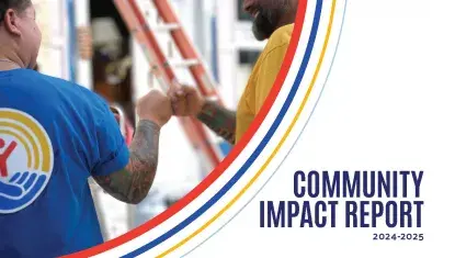 Community Impact Report Cover of two men fist bumping wearing United Way tshirts while volunteering